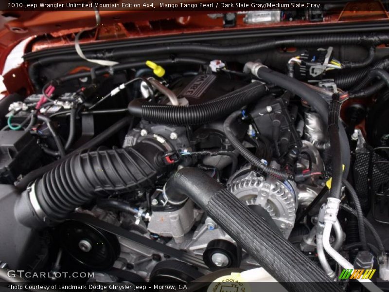 Mango Tango Pearl / Dark Slate Gray/Medium Slate Gray 2010 Jeep Wrangler Unlimited Mountain Edition 4x4