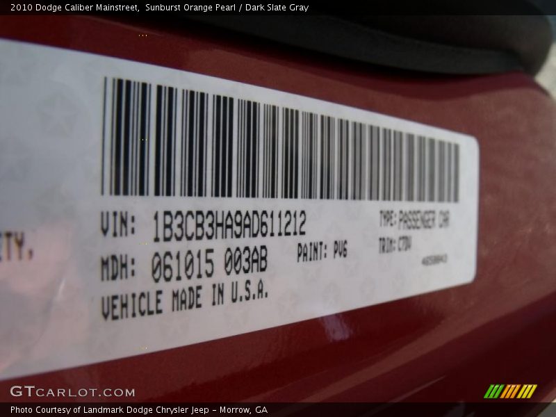 Sunburst Orange Pearl / Dark Slate Gray 2010 Dodge Caliber Mainstreet