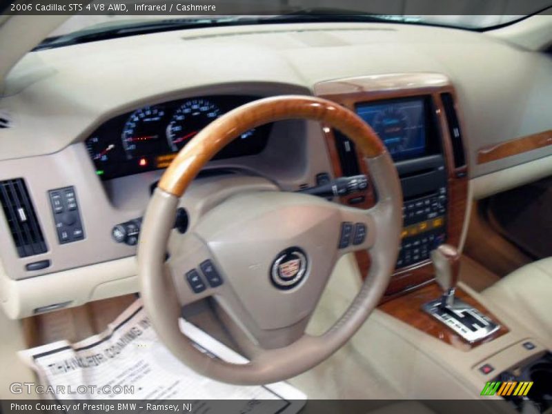 Infrared / Cashmere 2006 Cadillac STS 4 V8 AWD