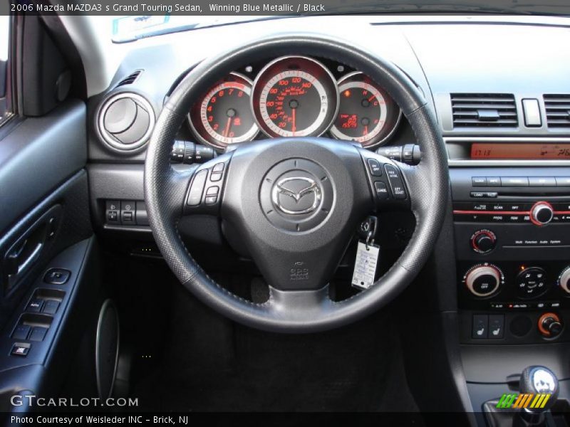 Winning Blue Metallic / Black 2006 Mazda MAZDA3 s Grand Touring Sedan