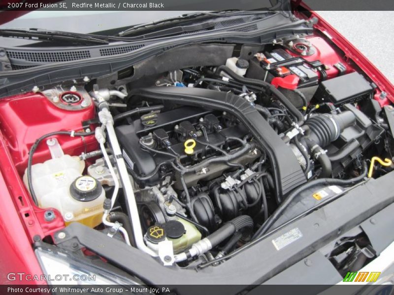 Redfire Metallic / Charcoal Black 2007 Ford Fusion SE