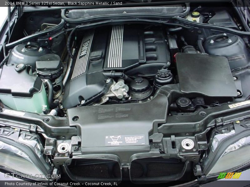Black Sapphire Metallic / Sand 2004 BMW 3 Series 325xi Sedan