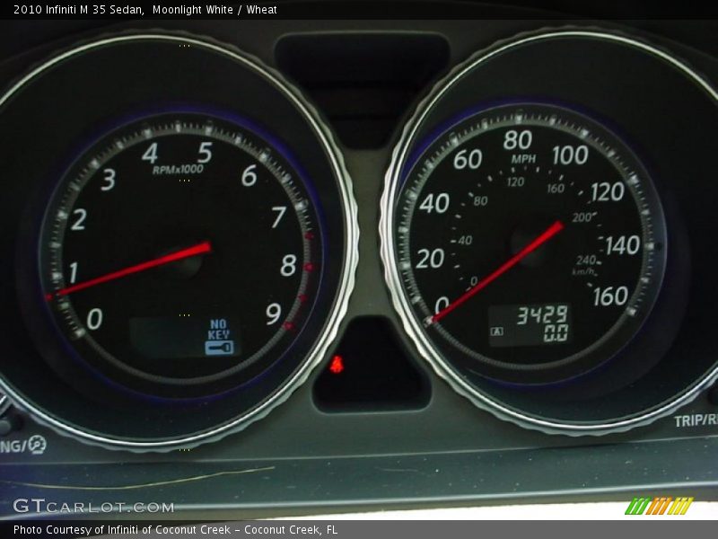 Moonlight White / Wheat 2010 Infiniti M 35 Sedan