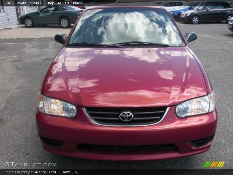 Impulse Red / Black 2002 Toyota Corolla CE