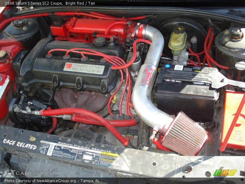 Bright Red / Tan 1998 Saturn S Series SC2 Coupe