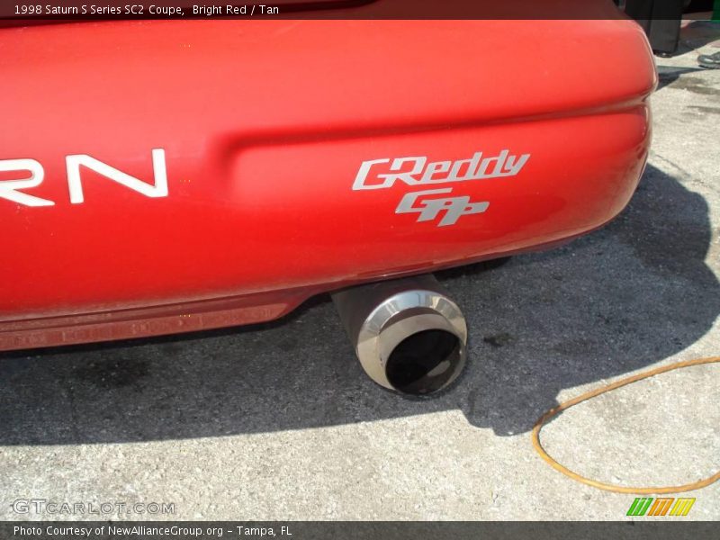 Bright Red / Tan 1998 Saturn S Series SC2 Coupe