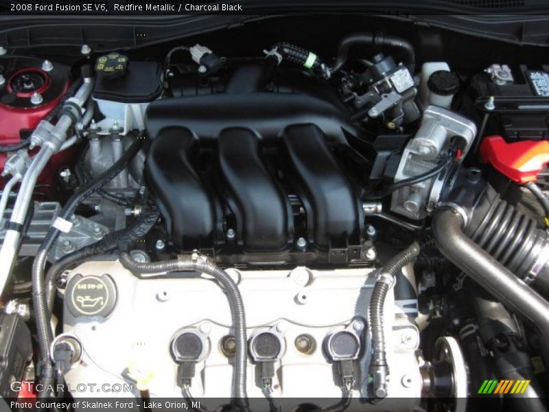Redfire Metallic / Charcoal Black 2008 Ford Fusion SE V6