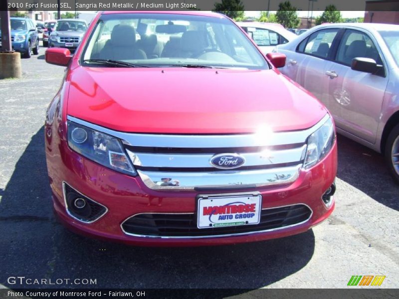 Sangria Red Metallic / Medium Light Stone 2010 Ford Fusion SEL