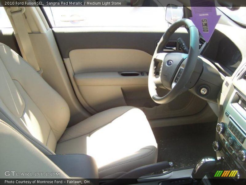 Sangria Red Metallic / Medium Light Stone 2010 Ford Fusion SEL
