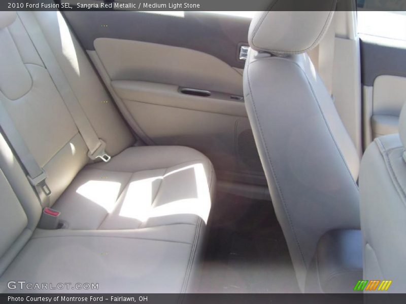 Sangria Red Metallic / Medium Light Stone 2010 Ford Fusion SEL