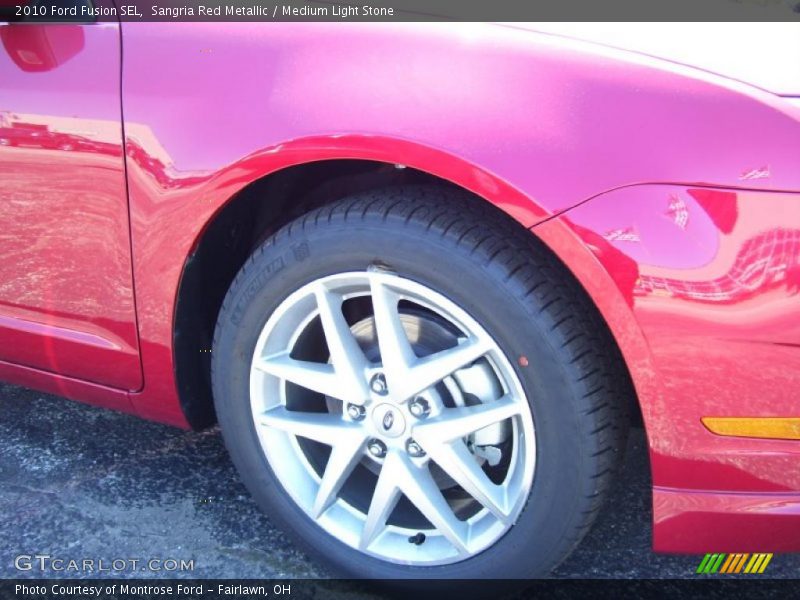 Sangria Red Metallic / Medium Light Stone 2010 Ford Fusion SEL
