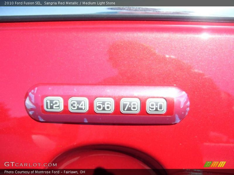 Sangria Red Metallic / Medium Light Stone 2010 Ford Fusion SEL