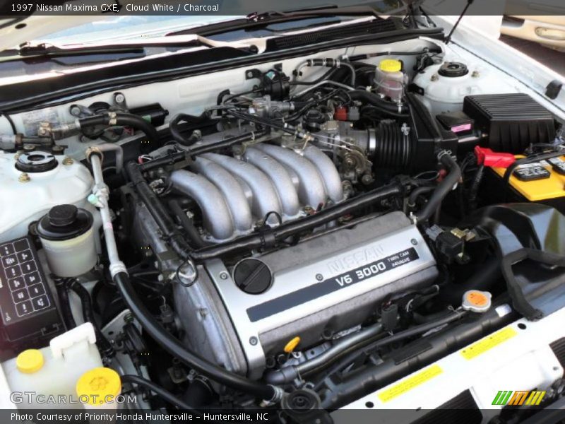 Cloud White / Charcoal 1997 Nissan Maxima GXE