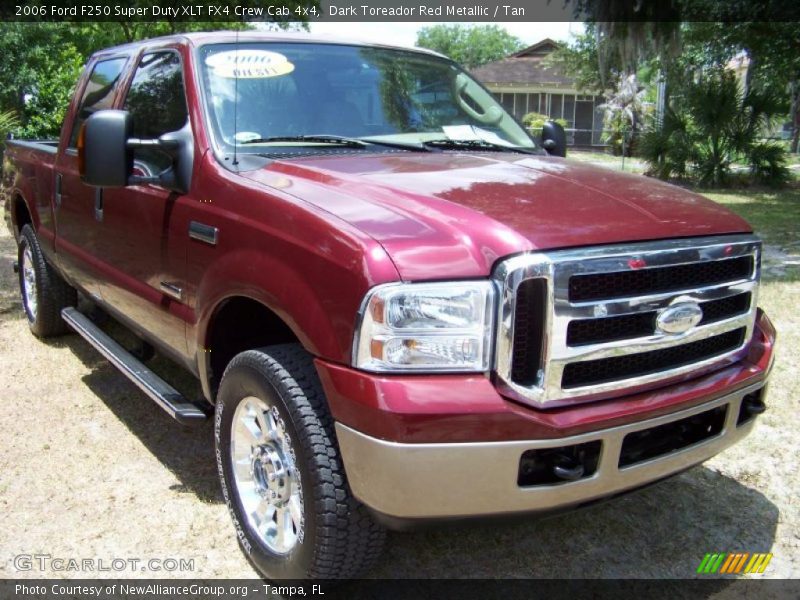 Dark Toreador Red Metallic / Tan 2006 Ford F250 Super Duty XLT FX4 Crew Cab 4x4