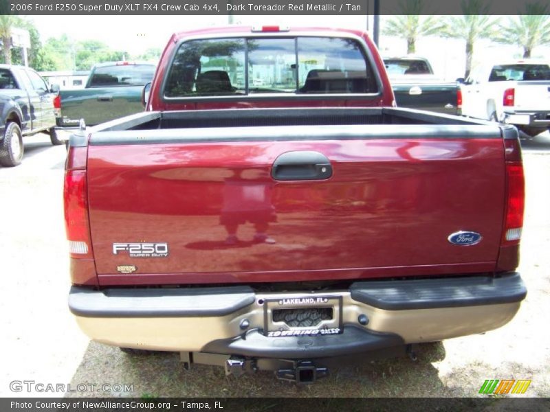 Dark Toreador Red Metallic / Tan 2006 Ford F250 Super Duty XLT FX4 Crew Cab 4x4