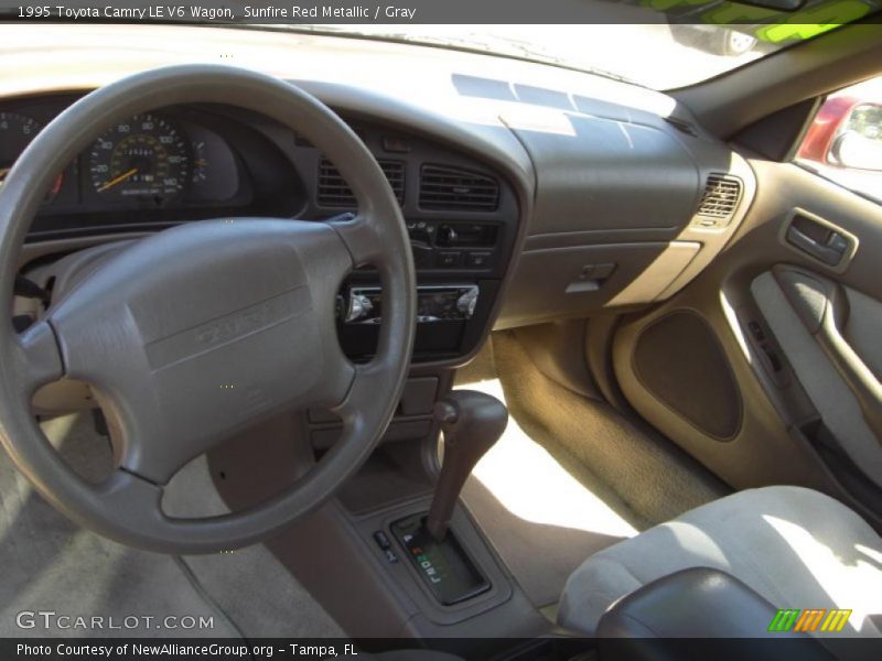 Sunfire Red Metallic / Gray 1995 Toyota Camry LE V6 Wagon
