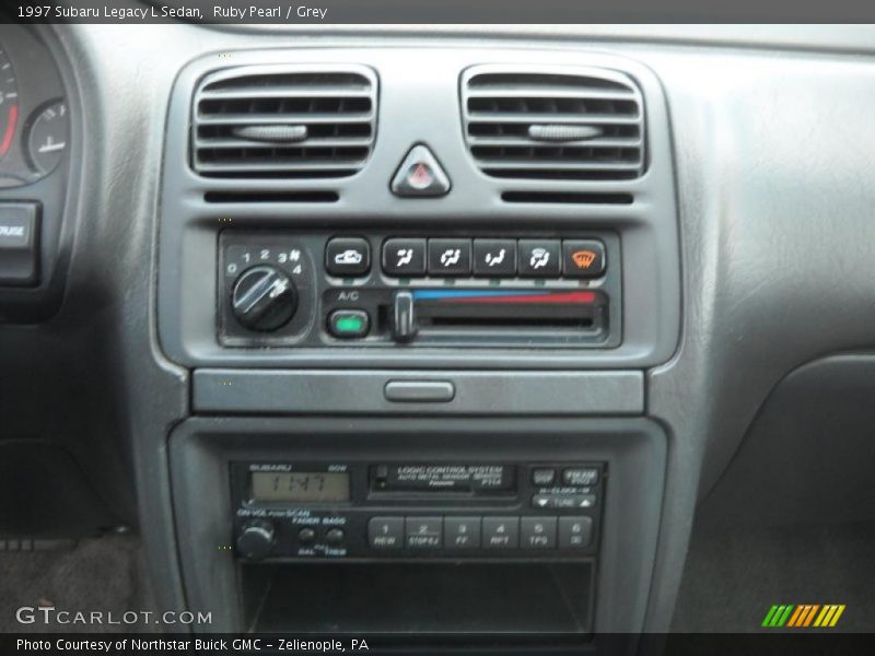Ruby Pearl / Grey 1997 Subaru Legacy L Sedan