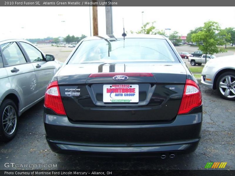 Atlantis Green Metallic / Medium Light Stone 2010 Ford Fusion SE