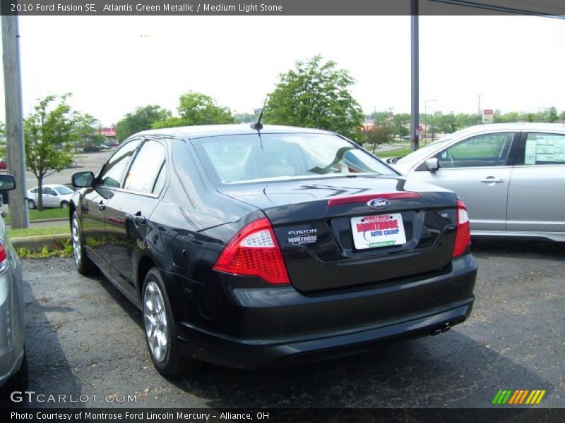 Atlantis Green Metallic / Medium Light Stone 2010 Ford Fusion SE