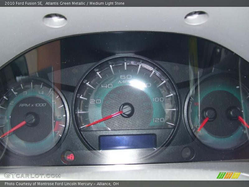 Atlantis Green Metallic / Medium Light Stone 2010 Ford Fusion SE