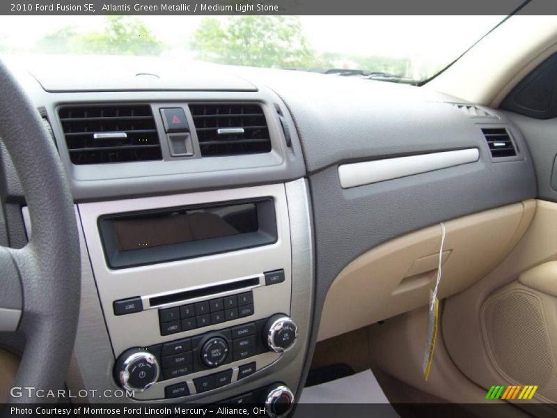 Atlantis Green Metallic / Medium Light Stone 2010 Ford Fusion SE