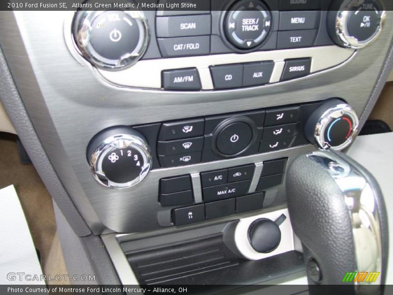 Atlantis Green Metallic / Medium Light Stone 2010 Ford Fusion SE