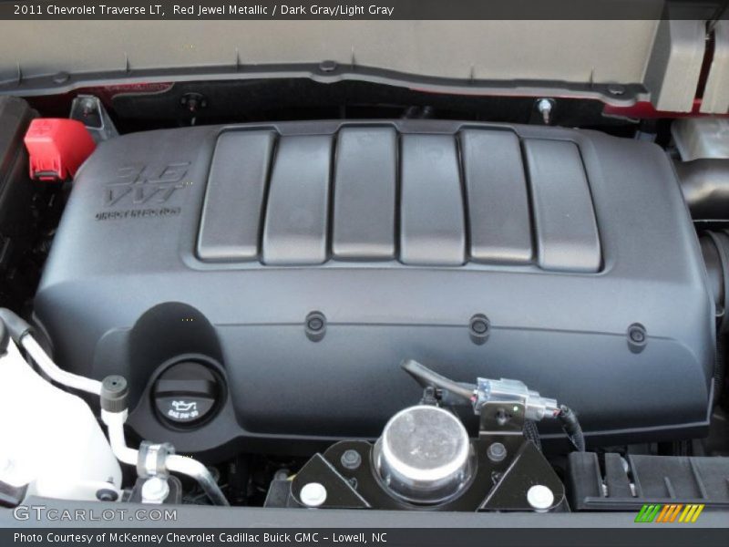 Red Jewel Metallic / Dark Gray/Light Gray 2011 Chevrolet Traverse LT