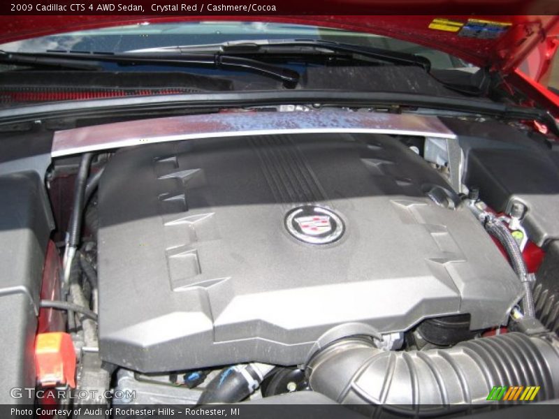 Crystal Red / Cashmere/Cocoa 2009 Cadillac CTS 4 AWD Sedan