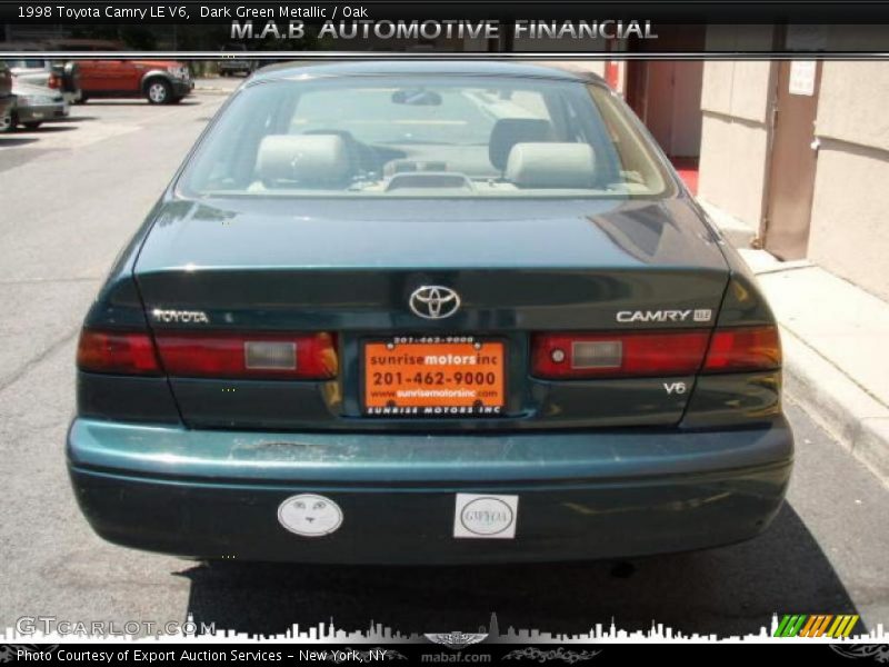 Dark Green Metallic / Oak 1998 Toyota Camry LE V6