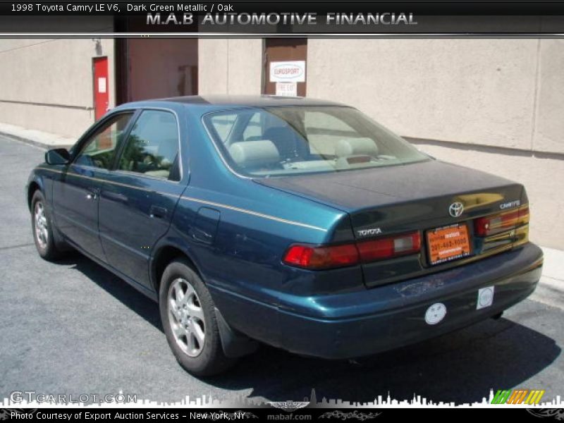 Dark Green Metallic / Oak 1998 Toyota Camry LE V6