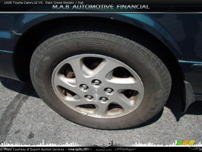Dark Green Metallic / Oak 1998 Toyota Camry LE V6