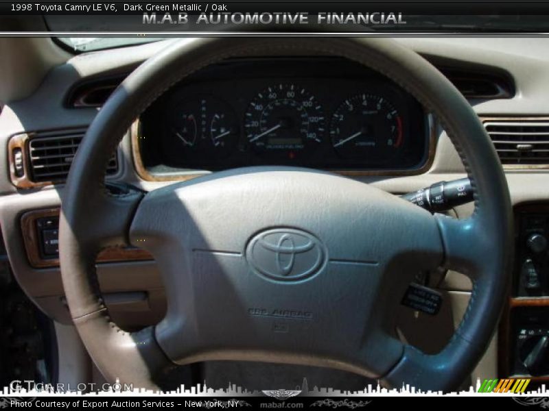 Dark Green Metallic / Oak 1998 Toyota Camry LE V6