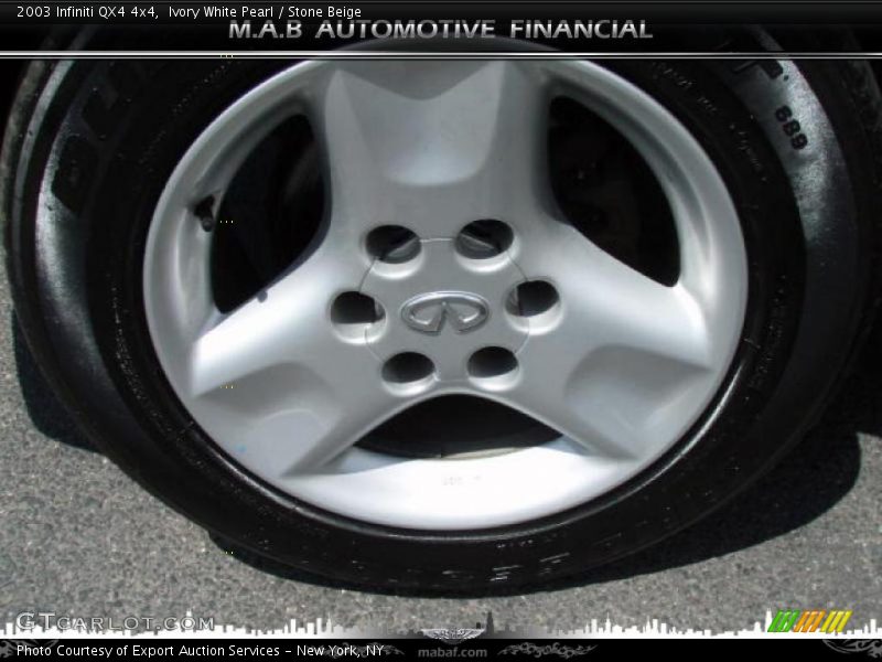 Ivory White Pearl / Stone Beige 2003 Infiniti QX4 4x4