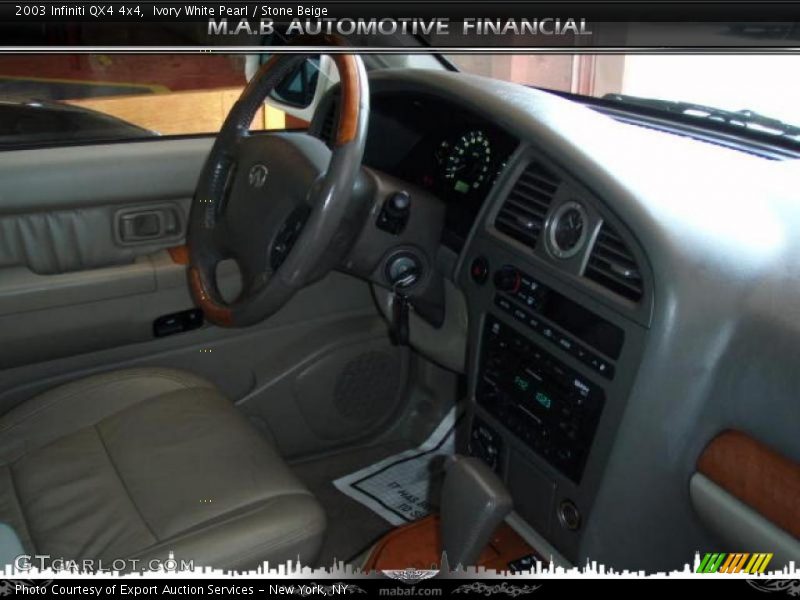 Ivory White Pearl / Stone Beige 2003 Infiniti QX4 4x4