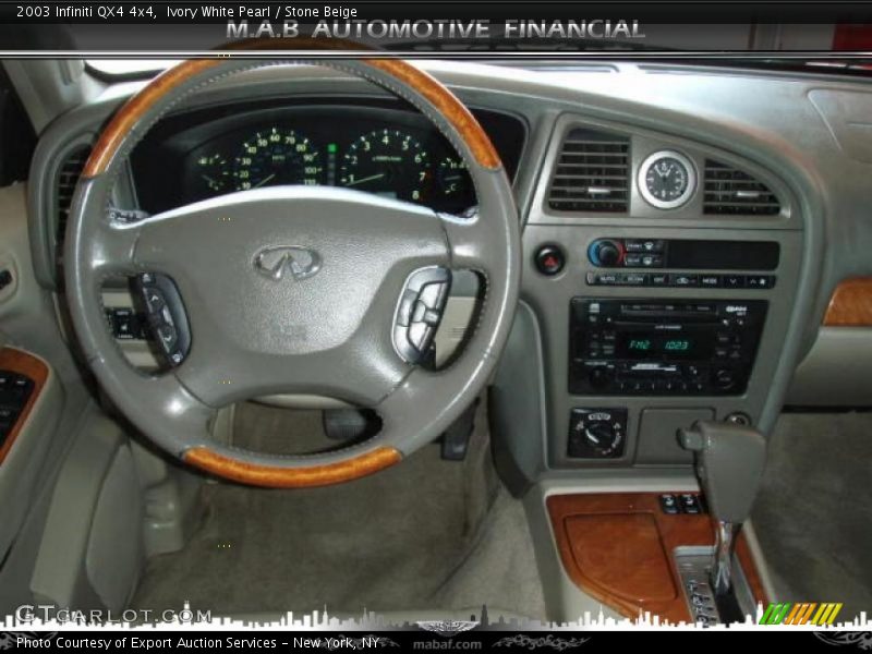 Ivory White Pearl / Stone Beige 2003 Infiniti QX4 4x4