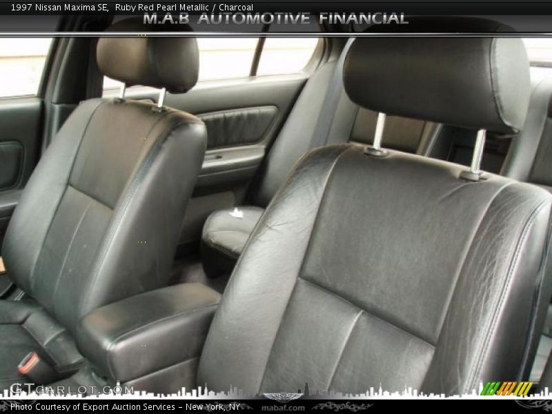 Ruby Red Pearl Metallic / Charcoal 1997 Nissan Maxima SE