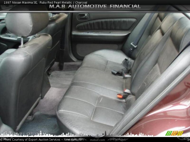 Ruby Red Pearl Metallic / Charcoal 1997 Nissan Maxima SE