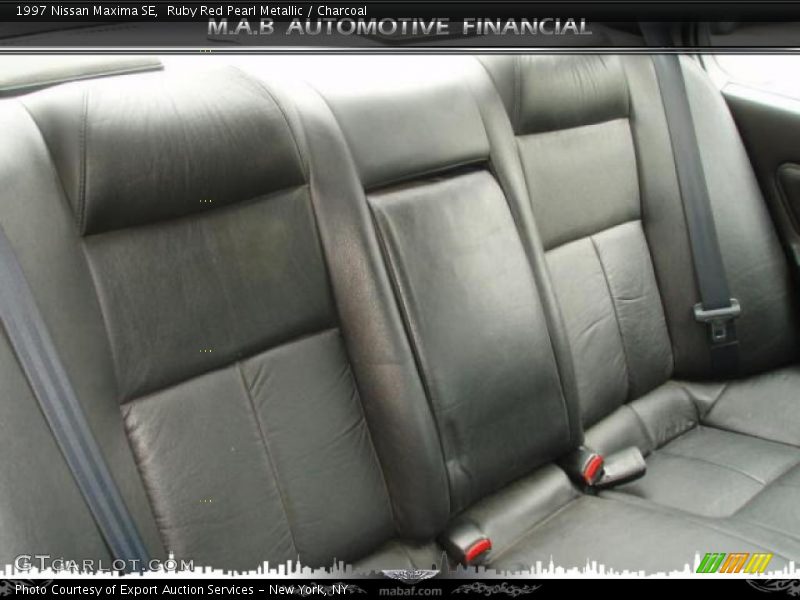 Ruby Red Pearl Metallic / Charcoal 1997 Nissan Maxima SE