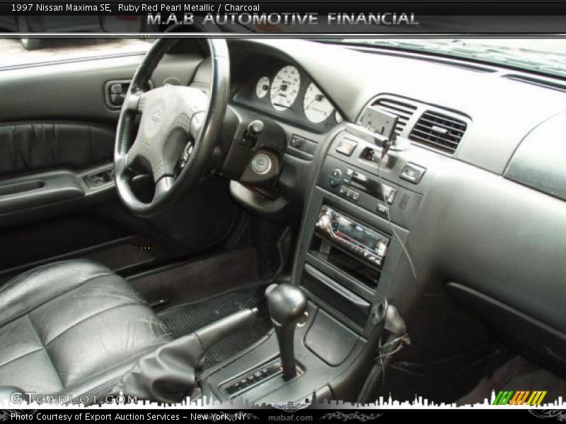 Ruby Red Pearl Metallic / Charcoal 1997 Nissan Maxima SE