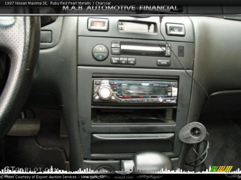 Ruby Red Pearl Metallic / Charcoal 1997 Nissan Maxima SE