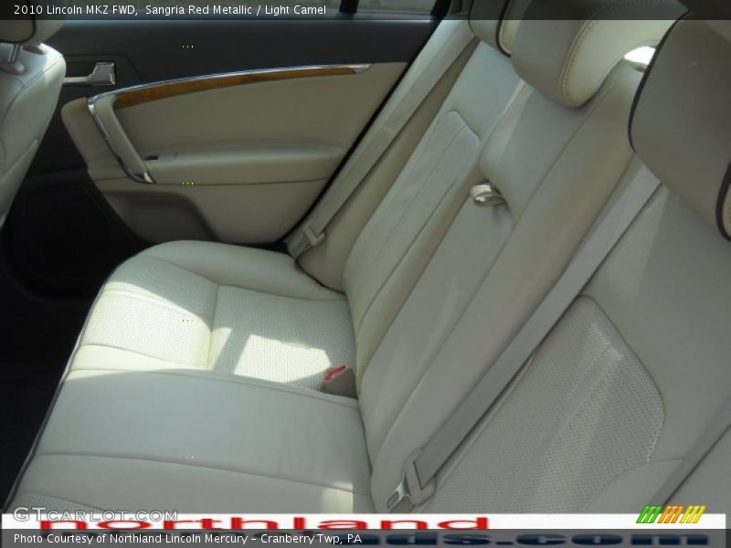 Sangria Red Metallic / Light Camel 2010 Lincoln MKZ FWD