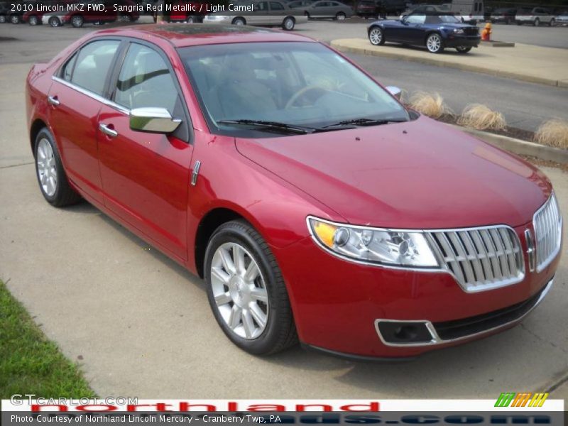 Sangria Red Metallic / Light Camel 2010 Lincoln MKZ FWD