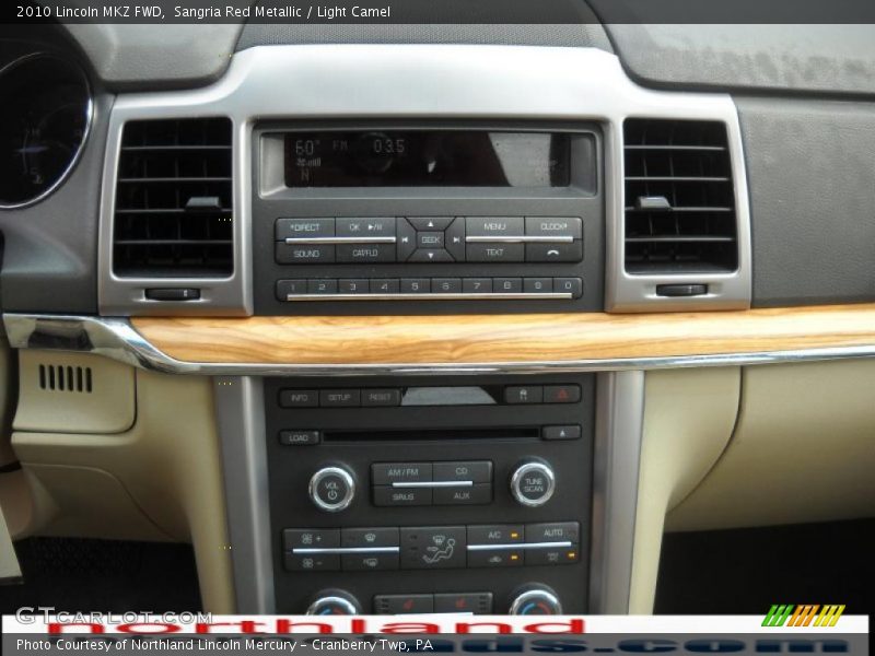 Sangria Red Metallic / Light Camel 2010 Lincoln MKZ FWD