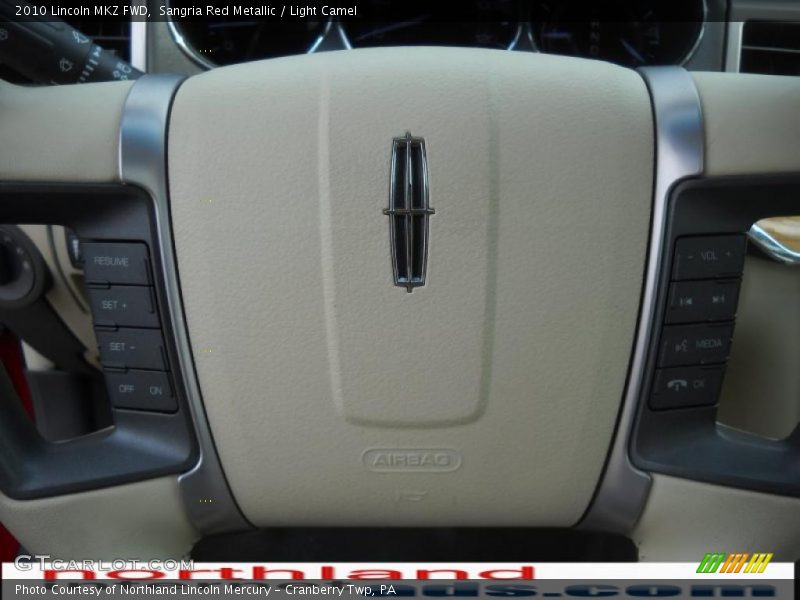 Sangria Red Metallic / Light Camel 2010 Lincoln MKZ FWD