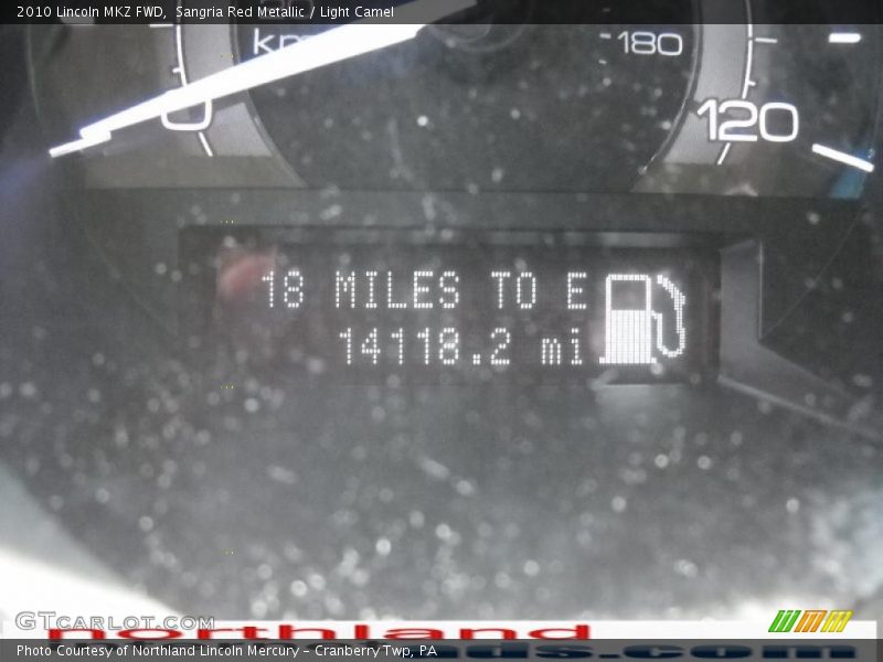 Sangria Red Metallic / Light Camel 2010 Lincoln MKZ FWD