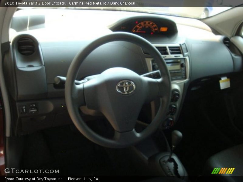 Carmine Red Metallic / Dark Charcoal 2010 Toyota Yaris 3 Door Liftback
