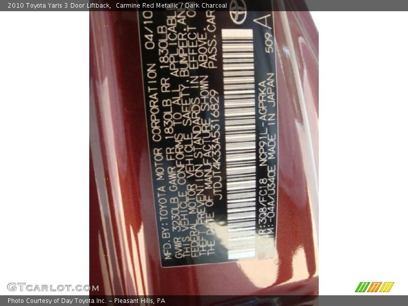 Carmine Red Metallic / Dark Charcoal 2010 Toyota Yaris 3 Door Liftback