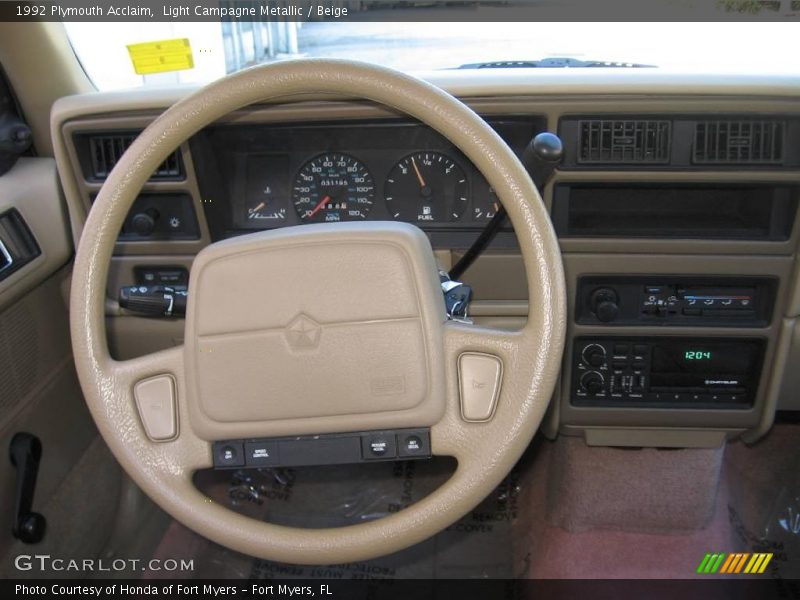 Light Campagne Metallic / Beige 1992 Plymouth Acclaim