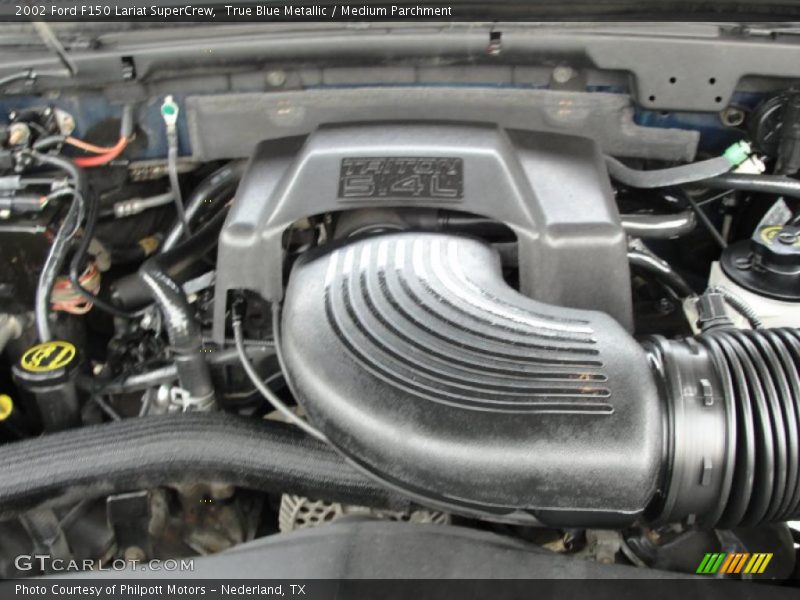 True Blue Metallic / Medium Parchment 2002 Ford F150 Lariat SuperCrew