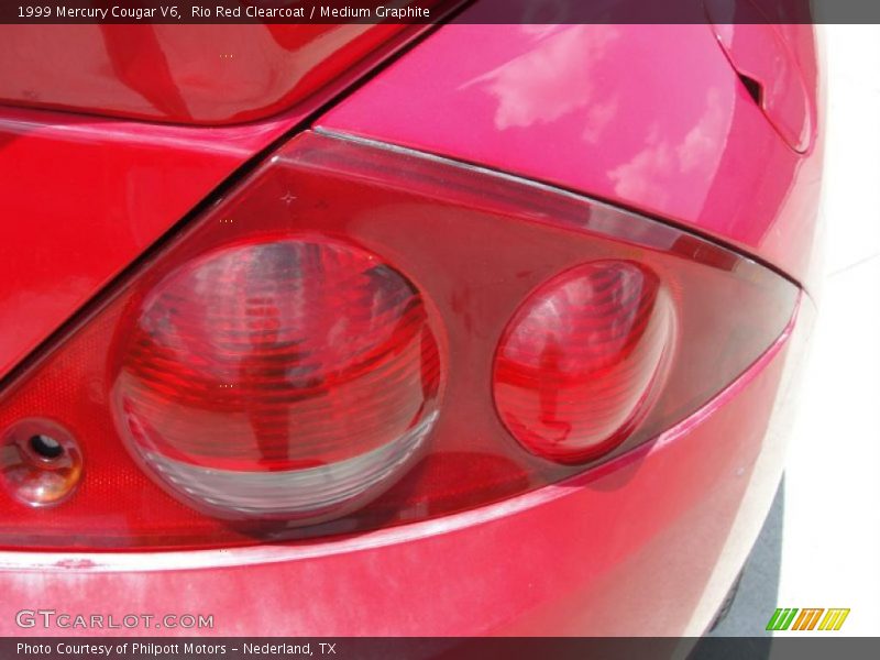 Rio Red Clearcoat / Medium Graphite 1999 Mercury Cougar V6